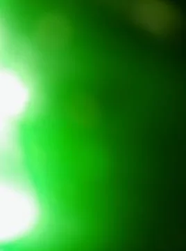 Abstract green background with different blurry elements 写真素材