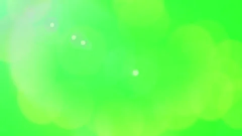 Abstract green background featuring soft glowing light orbs floating across 스톡 동영상 345216705