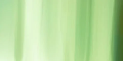Abstract green background with some smooth lines in it and some motion blur Stock Photos