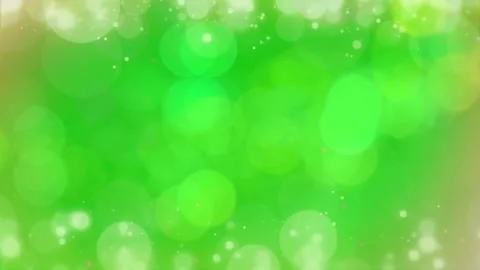 Abstract green background with tiny shimmering particles floating amidst larger Stock Footage 345216344