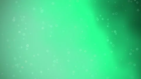 Abstract green bubbles float upward against a soft gradient background Stock Footage 346809711