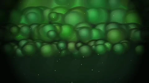Abstract green bubbles floating against dark background with ethereal glowi.. Video stock 346715936