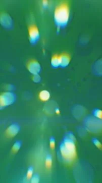 Abstract green glowing light rays and bokeh shapes creating dynamic energy .. Stockillustratie
