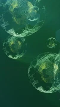 Abstract green glowing translucent spheres resembling organic cells or micr.. Stock Illustration