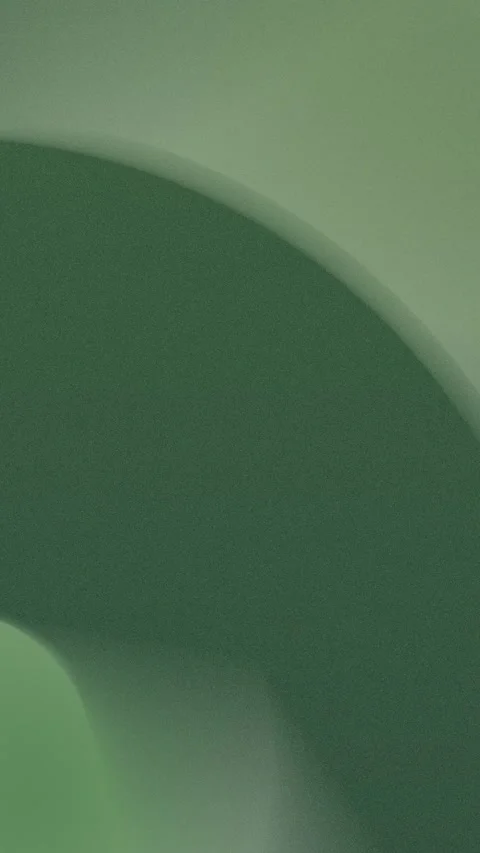 Abstract green gradient with soft rounded curves. Seamless loop background. 4K. 動画素材 309956564