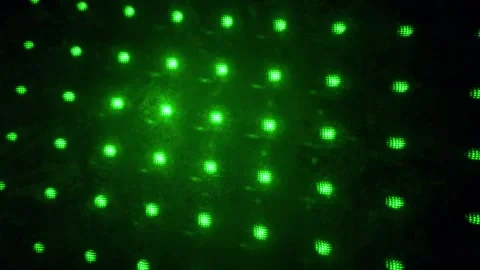 Abstract Green Laser Light Dots Pattern Rotating In Dark, 4k video Stock Footage 340523055