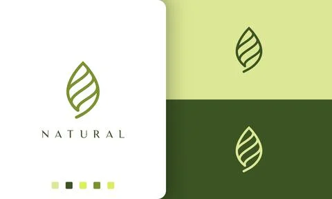 Abstract green leaf logo with simple and modern style Stock Illustration