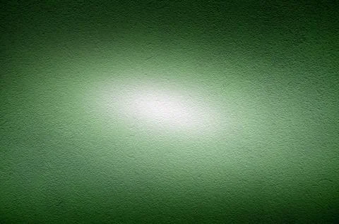 Abstract Green Light Rays on Concrete Background. Vibrant Glowing Light Textu Stock Photos