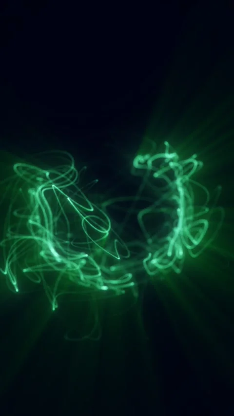 Abstract green light scribble forming energetic glowing trails on dark back.. Video stock 324039406