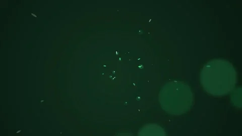 Abstract Green Organic Shapes Floating Amidst Bokeh Lights and Particles in.. Stock Footage 340939643