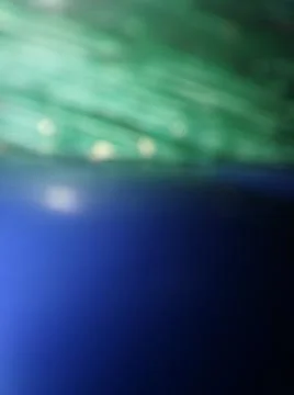 Abstract green shiny background with different elements in space Stock Photos