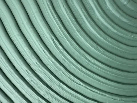 Abstract green textured background with concentric circular patterns and or.. Stock Photos