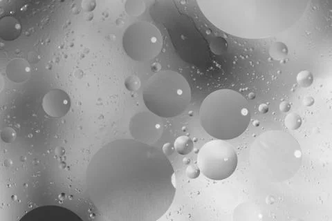 Abstract grey background with bubbles in the water Stock Photos