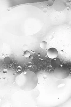 Abstract grey background with bubbles in the water Stock Photos