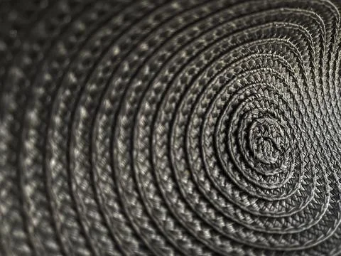 Abstract grey colour background from circular wicker pattern texture. Foto stock