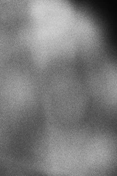 Abstract grey gradient background with soft light and grainy texture Stock Photos