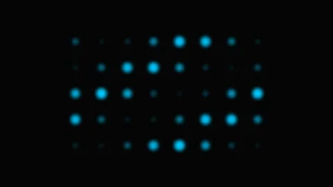 Abstract grid of glowing blue dots arranged in a dark digital pattern 库存影片 339617465
