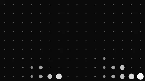 Abstract grid of illuminated circles with varying light intensities on black Stock Footage 339617056