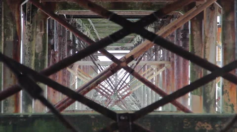 Abstract Grunge Pull Focus Through Rusty Pillar Supports of Teignmouth Pier 動画素材 46510070