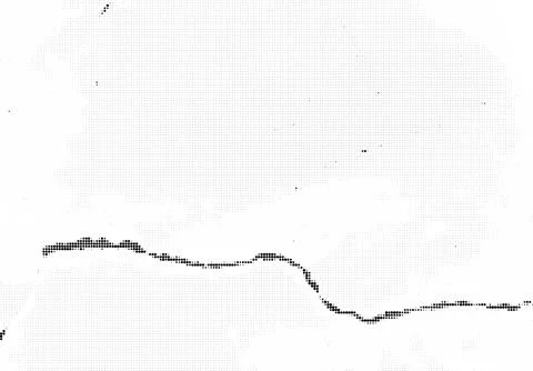 Abstract halftone pattern with scattered black dots on white background Illustrazione stock