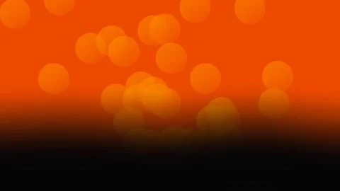 Abstract Halloween Bokeh Light Background with Floating Orange Glow Circles.. Stock Footage 344864050
