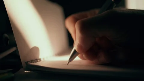 Abstract hands are writing on the paper. Handwriting, hand writes a pen in a Stock Footage 127452267