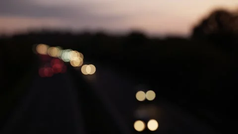 Abstract headlights from traffic on busy road 6K Video stock 292643485