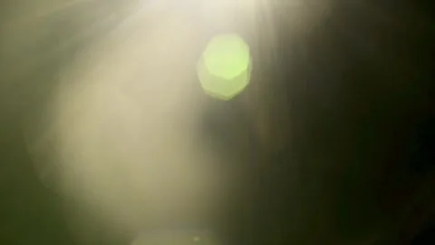 Abstract heavy light leaks and intense lens flare on black background Stock Footage 345960783
