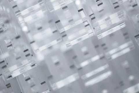 Abstract high-tech background. Details of transparent plastic or glass. Laser Stock Photos