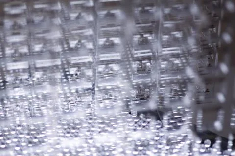 Abstract high-tech background. Details of transparent plastic or glass. Laser Stock Photos