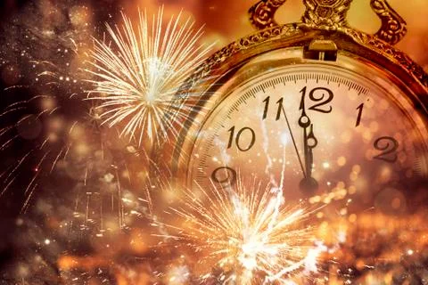 Abstract holiday background with clock close to midnight 库存照片