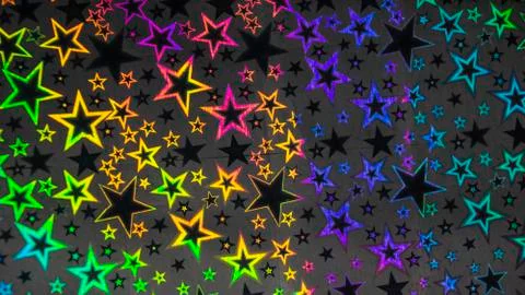 Abstract holiday background five pointed stars multicolor glow iridescence pa Stock Photos