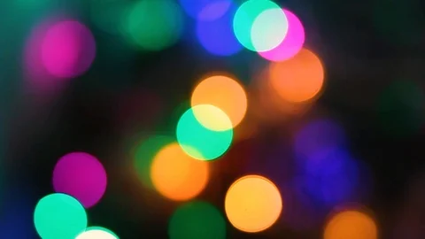 Abstract Holiday Blurred bokeh blinking multicolored neon lights on dark Video stock 123293077
