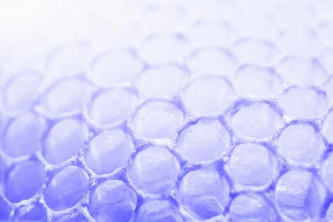 Abstract honeycomb cells pattern in violet tones Stock Photos