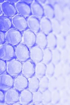 Abstract honeycomb cells pattern in violet blue tones Stock Photos