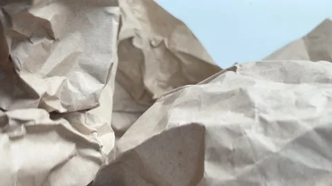 Abstract horizontal b-roll with camera moving through wrinkled recycled paper Stock Footage 336966923
