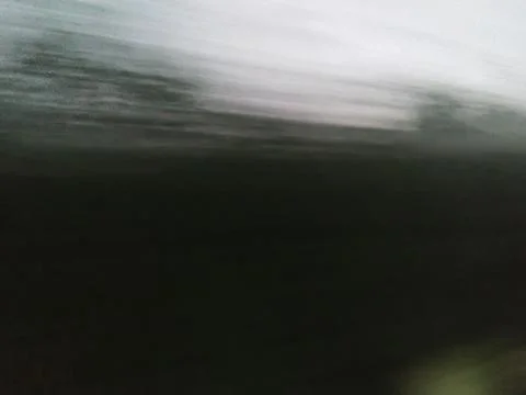 Abstract horizontal grey and white motion blur streaks Stock Photos