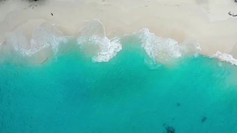 Abstract idyllic white sand beach with breaking waves in Bali Stock Footage 151735449