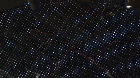 Abstract illuminated ceiling grid with thousands of sparkling LED lights Vídeo Stock 346506601