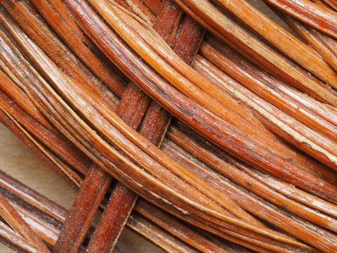 Abstract image, background, texture, closeup. wicker basket. curved orange an Stock Photos