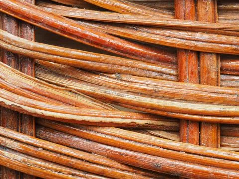 Abstract image, background, texture, closeup. wicker basket. curved orange an Stock Photos