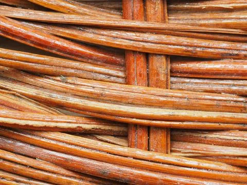 Abstract image, background, texture, closeup. wicker basket. curved orange an Stock Photos