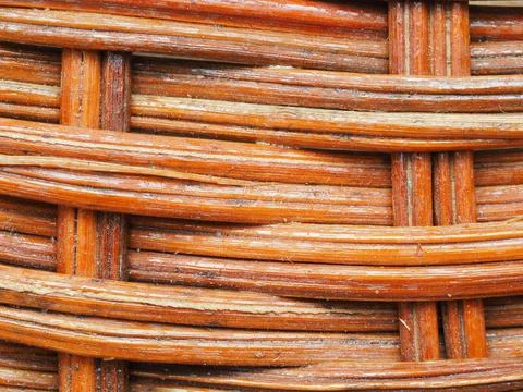Abstract image, background, texture, closeup. wicker basket. curved orange an Stock Photos
