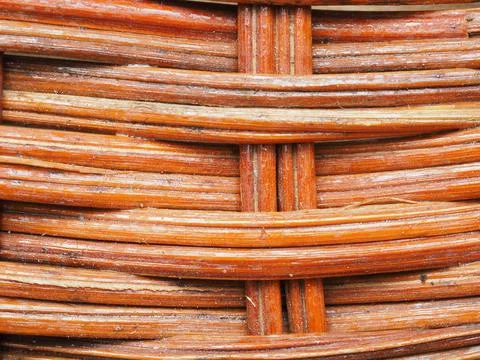 Abstract image, background, texture, closeup. wicker basket. curved orange an Stock Photos