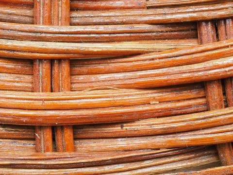 Abstract image, background, texture, closeup. wicker basket. curved orange an Stock Photos