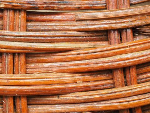 Abstract image, background, texture, closeup. wicker basket. curved orange an Stock Photos