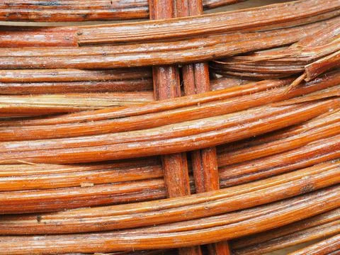 Abstract image, background, texture, closeup. wicker basket. curved orange an Stock Photos