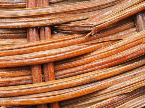 Abstract image, background, texture, closeup. wicker basket. curved orange an Stock Photos