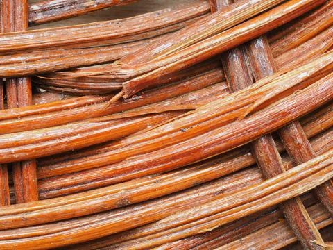 Abstract image, background, texture, closeup. wicker basket. curved orange an Stock Photos