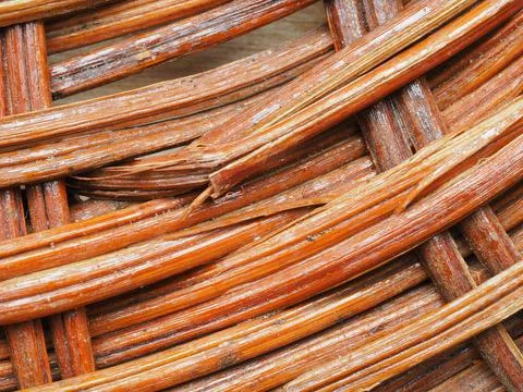 Abstract image, background, texture, closeup. wicker basket. curved orange an Stock Photos